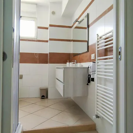 Апартаменты Serao House, 1 Piano In Centro *